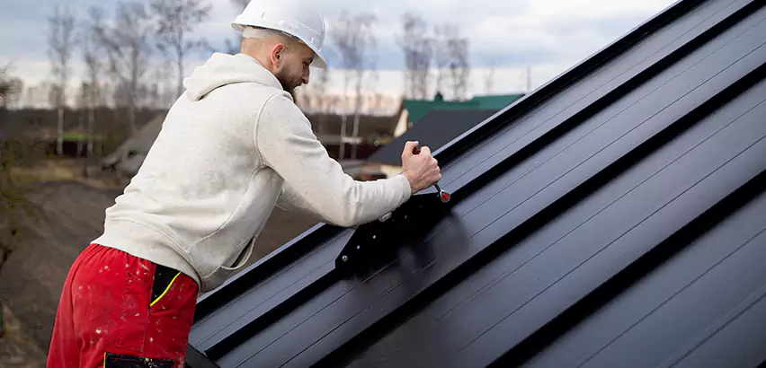 Tin Roof Ridge Cap Installation in Elmwood Park